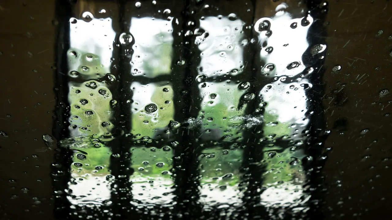 View through a windshield inside an automatic car wash