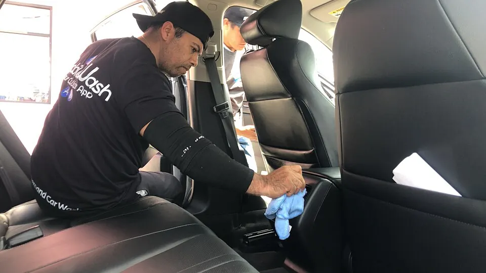 Vehicle interior being carefully cleaned